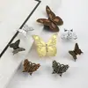 Manija moderna de lujo ligero estilo chino de mariposa simulada de aleación de zinc para instalación en puertas de sala de estar, dormitorio, cajones, gabinetes y alacenas