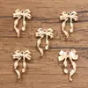 14 Tipos de Accesorios para Joyería DIY de Aleación Color Oro Kc que Conserva el Color, Colgantes de Moño Huecos Lindos y Modernos Variados