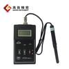 Medidor de campo magnético de superficie portátil con pantalla digital HT20 y adaptador de corriente estándar.