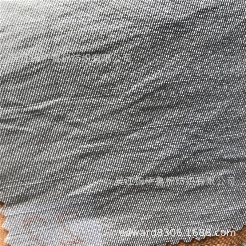 单丝人棉斜纹提花竹节.jpg