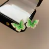 Pendientes de borla de flor de cuentas de color dopamina para primavera, sensación de lujo ligero y alta gama, pendientes atmosféricos estilo vacacional para mujer