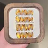 Oro Ámbar Mar Puro Hecho a Mano Portátil Uñas Cortas Estilo Ins Parche de Uñas Doudou de Alta Gama Uñas Postizas