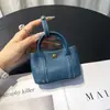 Bolso de mano mini lindo para mujer de piel de vaca de primera capa, bolso pequeño con colgante, bolsa para guardar auriculares y llaves, tarjetero, monedero de cuero genuino