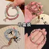 Pulseras populares multicapa de estilo chino Pulseras étnicas retro chinas exquisitas con cuentas Venta al por mayor Accesorios de mano 2025 Primavera y Verano Nuevo estilo