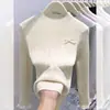 Top de punto de manga larga con cuello redondo y encaje de corbata de lazo para mujer, nueva camisa básica ajustada de otoño e invierno