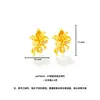 Novos Brincos de Tarraxa Flor de Íris Banhados a Ouro Estilo Chinês para Mulheres, Brincos de Bouquet com Fita Gravada Tendência Nacional Retrô com um Toque de Luxo