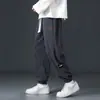 Calças casuais de veludo cotelê para outono para homens, novas calças jogger de retalhos de chenille com corte solto, calças de moletom esportivas de marca da moda