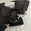Bolso plisado con estampado floral nuevo 2026, un estilo delicado y femenino, con cadena de perlas y un dulce lazo, perfecto como bolso cruzado pequeño