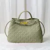 Bolso tote de diseño de nicho de moda, nudo metálico, tejido de cuero, hombro, portátil, gran capacidad, piel de vaca, bolso para mujer