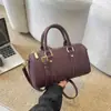 Bolsa de bolos de estilo retro de alta gama para mujer, colección de otoño 2026, bolso de hombro simple y moderno, nuevo bolso cruzado versátil
