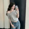 Blusa de tricô ombro a ombro vazada estilo francês para mulheres, verão estilo coreano branca que rejuvenesce, manga curta, justa, design de nicho