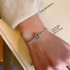 Pulsera de Camelia Negra con Circonita Estilo Chanel para Mujer, Diseño Exquisito de Lujo Ligero de Nicho, Pulsera Ajustable, Nuevo Modelo 2026