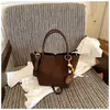 Bolsa de Mão de Pelúcia Camurça Nicho Feminina 2026 Novo Estilo Popular Este Ano Item Quente Bolsa de Mão Ombro Único Transversal Bolsa Saco