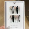 Uma Gu [Coração de Corvo Negro] Estilo Doce e Cool Escuro Armadura Usável de Metal com Diamantes e Olho de Gato Brilhante