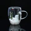 Taza de Vidrio Escena de Nieve Navideña Venta al por Mayor Transfronteriza Regalos Navideños Taza con Rama de Pino Escena de Nieve Navideña Taza de Doble Pared de Alto Borosilicato