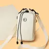 Nueva bolsa para teléfono móvil para mujer, simple y elegante, textura de PU, bolso de hombro a la moda, casual y versátil, bolso cruzado ligero para mujer