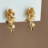 Aretes de Borla Flor Dorada Super Hada, Aretes de Nicho, Hojas Doradas de Alta Gama, Lujo Accesible Estilo Chino Nuevo