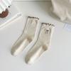 Calcetines de encaje con lazo para mujer, bordados, de media caña, estilo japonés, estilo universitario, con borde de oreja y apilados.