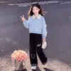 Conjunto de Dos Piezas para Niñas 2026 Primavera y Otoño Nuevo Top con Lazo y Estampado de Gato Pantalones Casuales Moda Tendencia