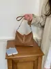 Bolsa de antebraço feminina 2026 nova moda outono bolsa de ombro versátil com toque de luxo para trabalho e deslocamento, bolsa tiracolo tipo balde