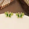 Brincos de borboleta de cristal verde com laço de mola, pino de prata 925, brincos degradê de gelo quebrado, brincos pop de nicho