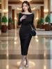 Elegante Vestido Negro Hombros Descubiertos para Otoño 2026, Nuevo Vestido Largo Bodycon Versátil de Corte Entallado con Pliegues