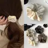 Anillo para el cabello con diamantes de imitación de satén avanzado para el intestino grueso, 2024, nuevo accesorio para el cabello, banda de goma elástica de alta calidad, cuerda para el cabello duradera.