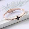 Moda coreana simples pulseira de trevo de quatro folhas com diamantes feminina pulseira de aço titânio ouro rosa 18K Atacado direto da fábrica