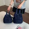 Mochila nueva para viajes diarios, mochila casual simple para el trabajo con bolsillos, versátil y ligera 2026