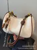 Bolso de axila retro de alta gama para mujer, nuevo y moderno bolso de hombro de nicho 2025 para el trabajo y los desplazamientos, bolso cruzado tipo dumpling