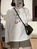 Novedad de Primavera y Otoño Estilo Divertido Simple Dibujos Animados Cachorro Camisetas de Manga Larga para Mujer Ropa Exterior Informal Suelta y Versátil