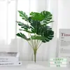 Viajero de hoja plátano palma Areca hoja de tortuga plástico planta verde pequeña con hierba manojo único flor artificial planta en maceta decoración paisajismo