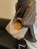 Bolso pequeño de alta gama transfronterizo para mujer, estilo verano 2026, moderno y sencillo, bolso tipo empanada de nicho, bolso versátil para hombro y cruzado