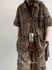 Camisa de manga corta a cuadros para hombre, estilo japonés de verano, retro, holgada, informal, de media manga, estilo americano, chaqueta de marca de moda urbana.