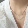 Collar con colgante geométrico de diamantes de estilo romántico francés, cadena superpuesta de doble capa con costuras, cadena de clavícula de acero y titanio.