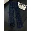 Pantalones de cuadros blancos estilo vintage americano transfronterizos para hombre, pantalones largos de verano con un toque de alta gama, de pierna recta casual ligeramente acampanados