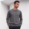 Suministro exclusivo transfronterizo Otoño/Invierno 2026 Nuevo Suéter de Punto para Hombre Cuello Redondo Holgado Jersey Versátil Manga Larga Capa Base