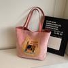 Mochila Biscuit Cat para mujer, otoño 2024, nueva bolsa de mano de estilo universitario de moda, bolso de hombro de gran capacidad de Corea del Sur.