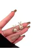 Aretes coreanos de nuevo estilo en forma de corazón cruzado, pequeños, simples y versátiles, al por mayor