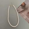 Collar retro de perlas para mujer, estilo frío, cadena ligera de lujo, diseño de nicho 2024, cadena de clavícula de moda