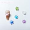 Popular joyería de uñas de dibujos animados transfronteriza que cambia de color luminosa de color sólido garra de gato joyería de uñas al por mayor accesorios de uñas lindos