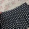 Falda corta mini plisada bodycon dulce y picante de línea A adelgazante Harajuku Y2K de lunares sexy caliente moda callejera retro de verano