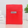 Bolsa de compras transfronteriza impermeable portátil bolsa de plástico portátil bolsa de supermercado portátil bolsa de protección ambiental color sólido multifuncional plegable bolsa de almacenamiento