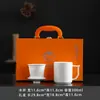 Taza de oficina de porcelana blanca en caja de regalo, taza de té de cerámica para uso doméstico, regalo de negocios para clientes