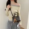 Bolsa de mão pequena super popular e requintada para mulheres, nova bolsa de ombro e transversal outono 2026, bolsa tipo balde de alta qualidade para o dia a dia