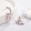 Pendientes de Lazo Francés con Perlas Rosadas de Imitación para Mujer 2026 Nuevo Popular Diseño de Nicho Pendientes de Moda y Elegantes