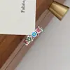 Anel popular de esmalte 2026 com esmalte colorido e pequenas flores, anel ajustável para mulheres, design de nicho, estilo ins, moderno para meninas