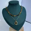 Collar de Piedra Ojo de Tigre Natural Retro Collar Cadena para Suéter Apilada Cadena para Clavícula Nuevo Otoño e Invierno 2025