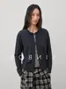 Outono 2026 Novo Estilo Feminino Top Solto de Manga Longa em Cor Contrastante Cardigan de Tricô de Lã de Ovelha