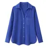 Ropa de mujer transfronteriza al por mayor 2026 nueva moda casual versátil color liso con botones manga larga cuello camisero top